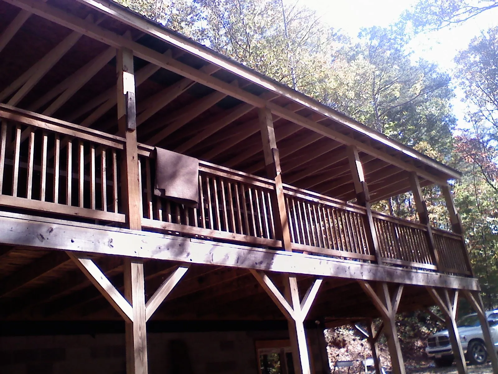 Timber framing under a new elevated porch and deck — Roof Leak Repair in Taunton by Roofing Brothers
